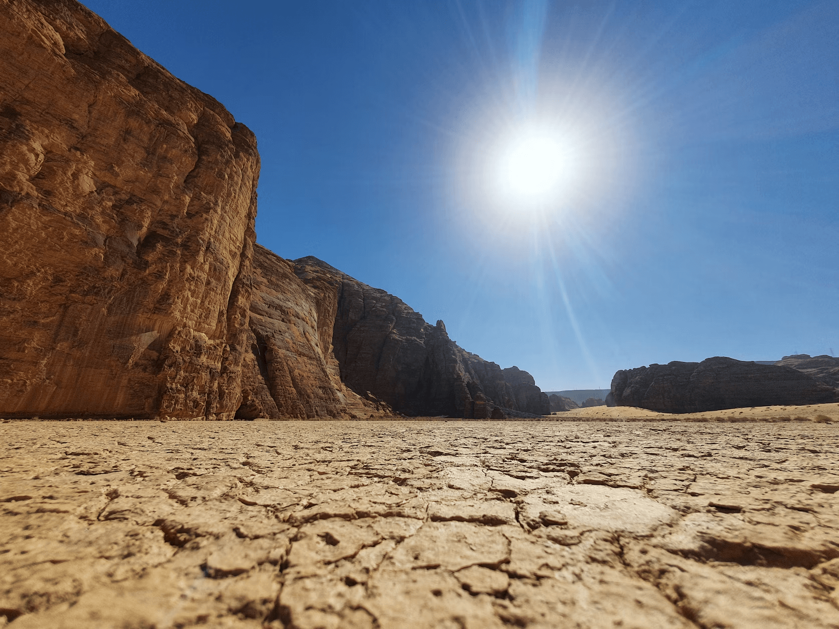 Desert landscape with intense sun showing extreme heat testing conditions
